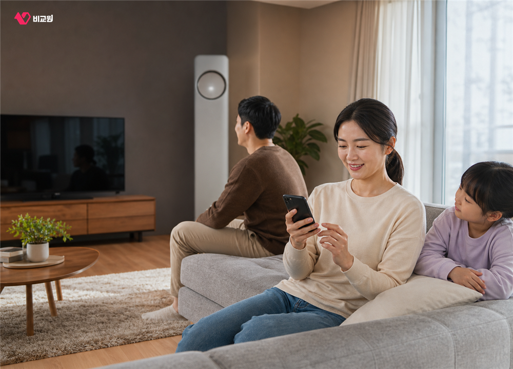 와이파이 설정 후 휴대폰·TV·스마트 가전의 연결을 확인하는 가족